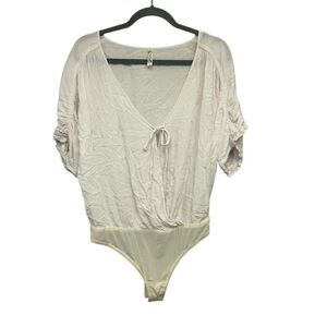 Free people blush pink Cleo bodysuit size medium